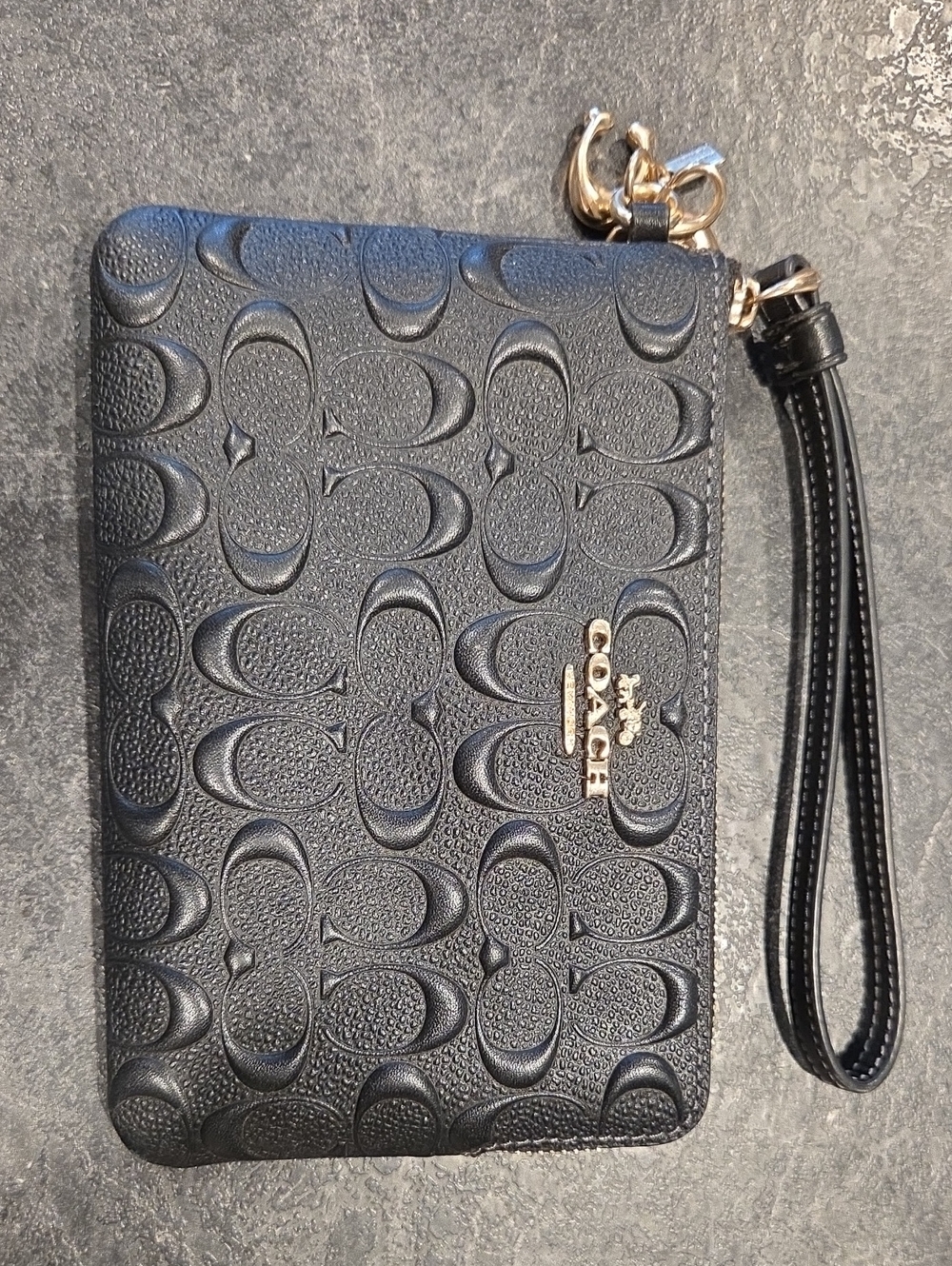 Coach Black Signature Embossed Leather Wristlet with Gold Logo